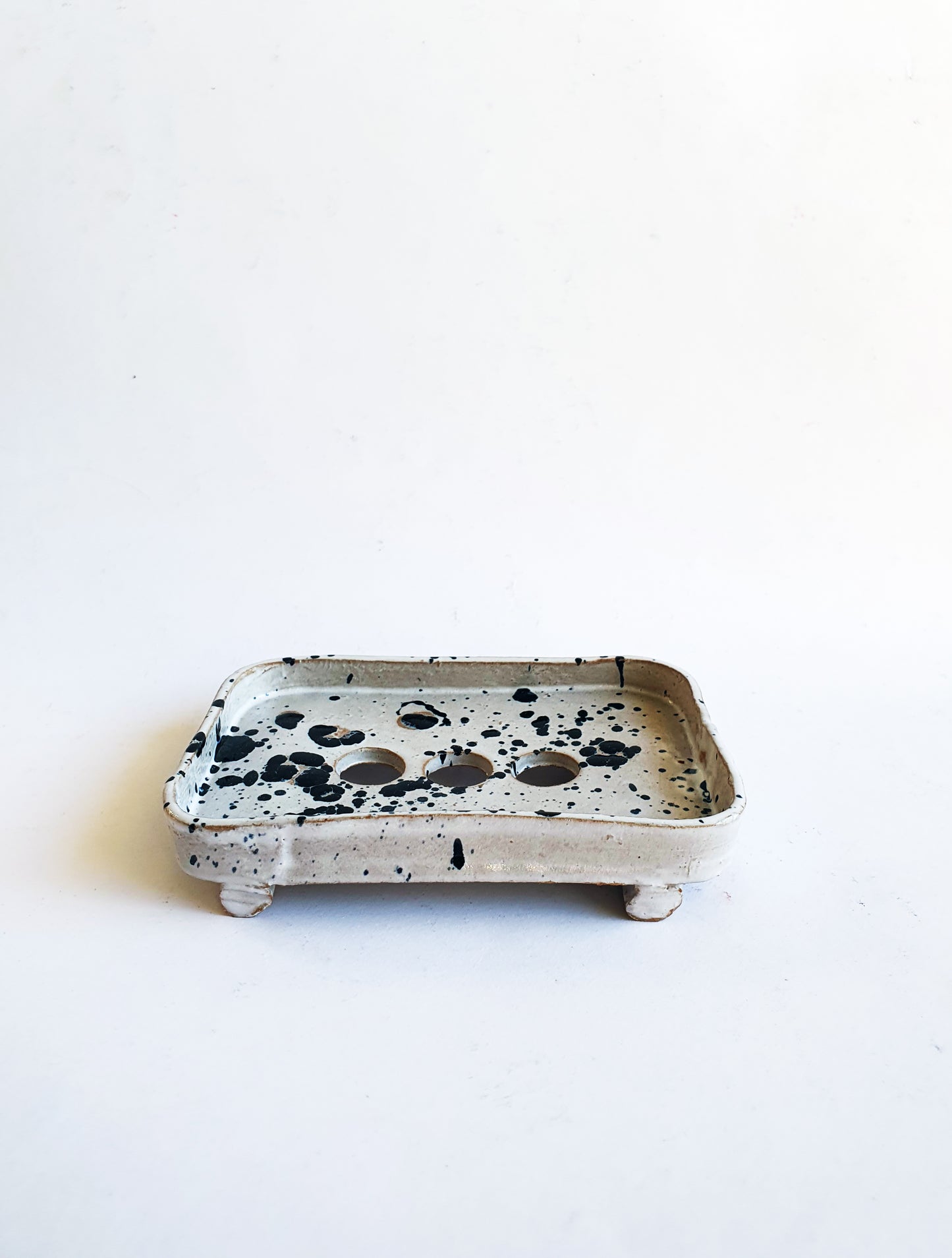 Porte savon tâches blanc/noir