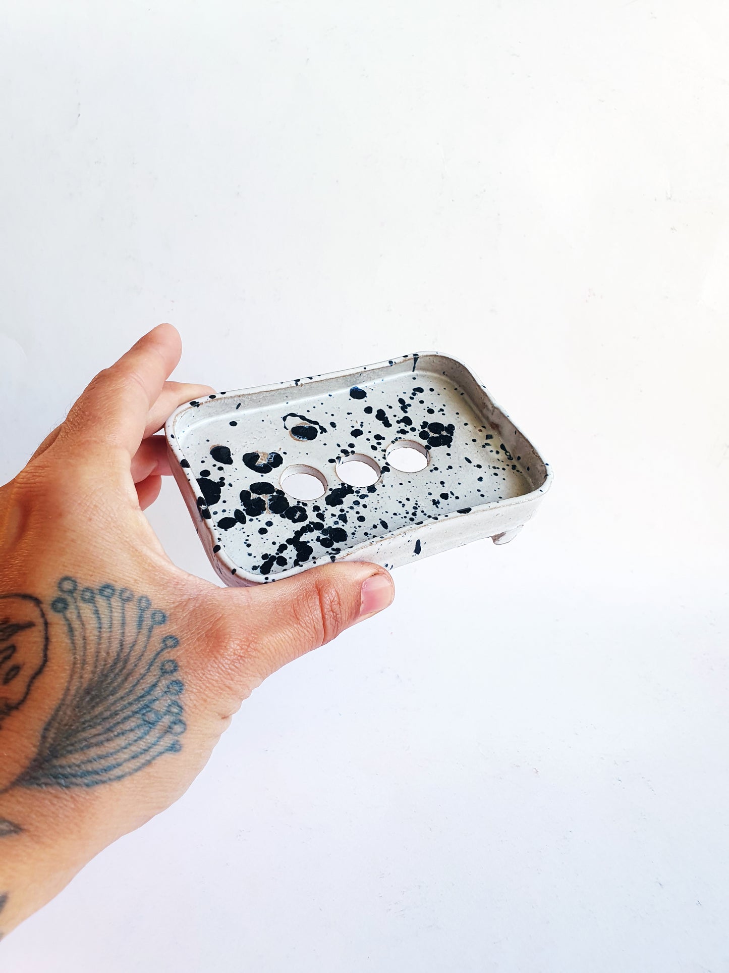 Porte savon tâches blanc/noir