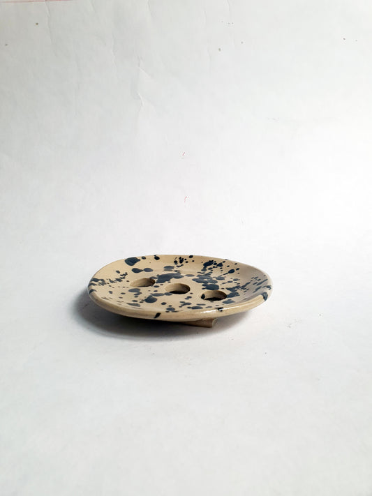 porte savon beige et noir à tâches