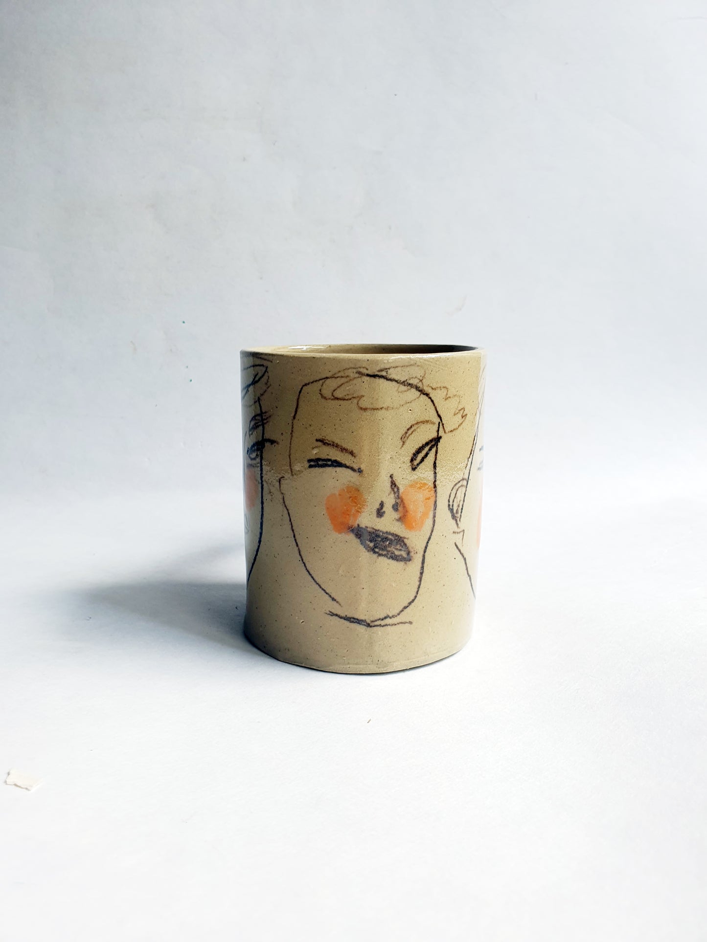 Tasse 35 cl visages et orange