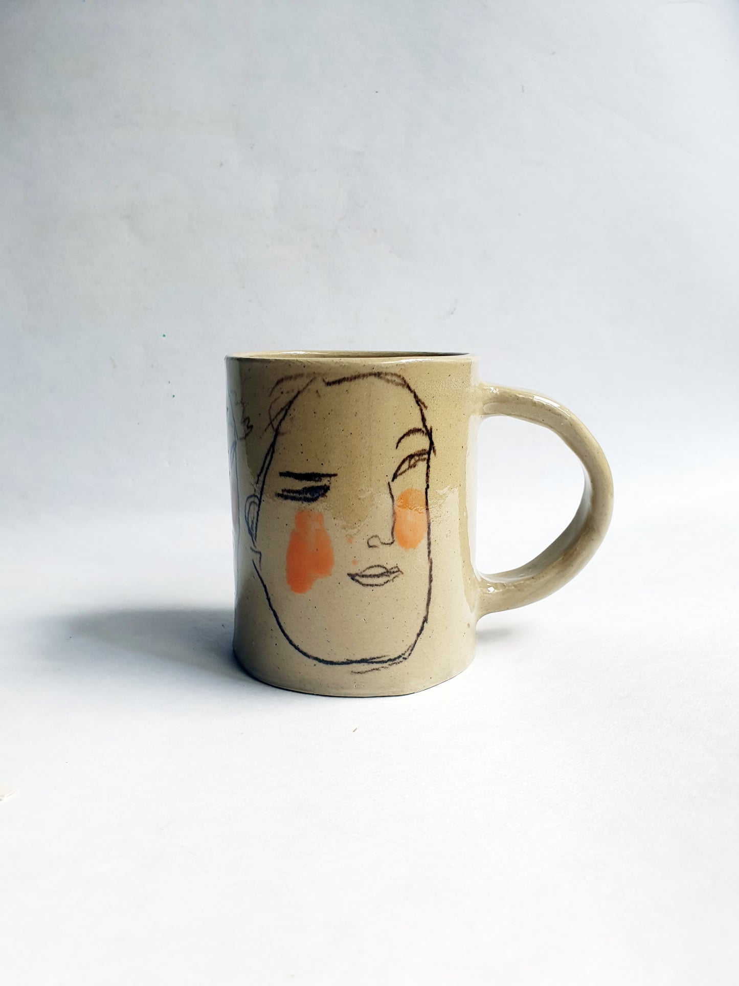 Tasse 35 cl visages et orange