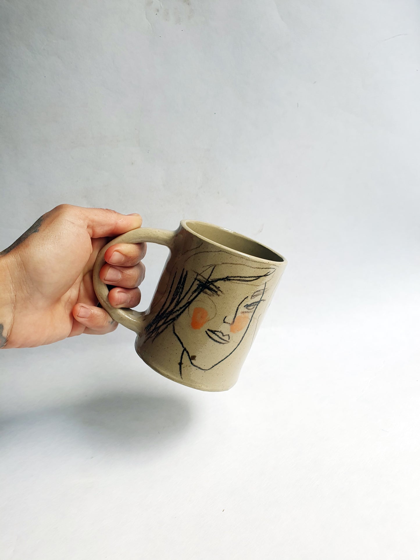 Tasse 35 cl visages et orange