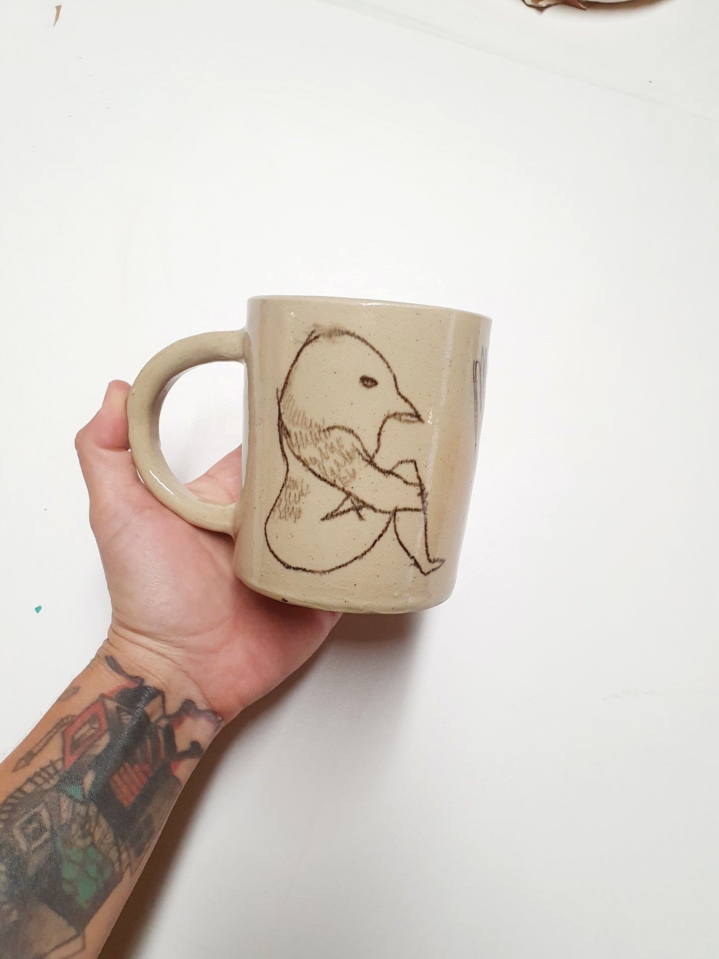 Tasse 35 cl oiseau assis/disco